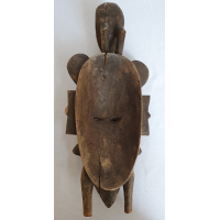 Afrikaans masker met vogel op hoofd